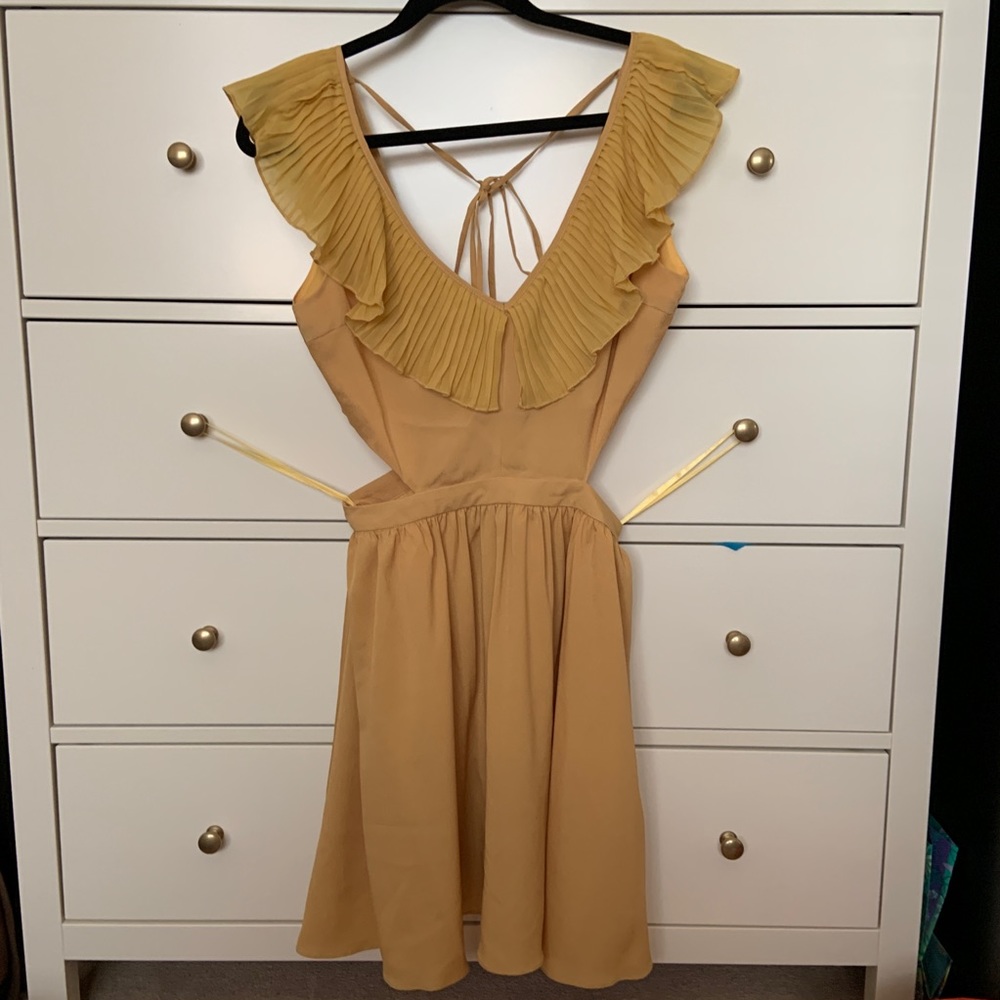 Yellow ruffled dress with open sides/back